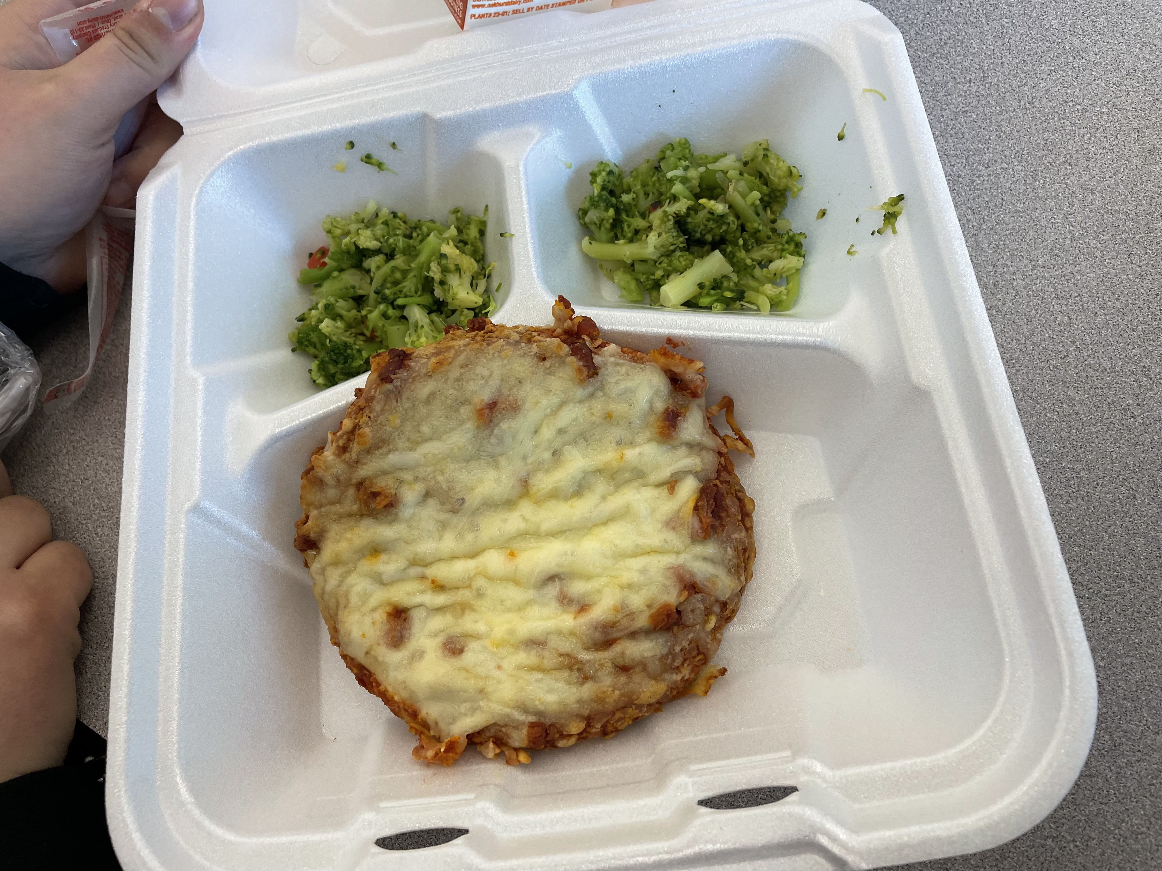 Round pizza with broccoli